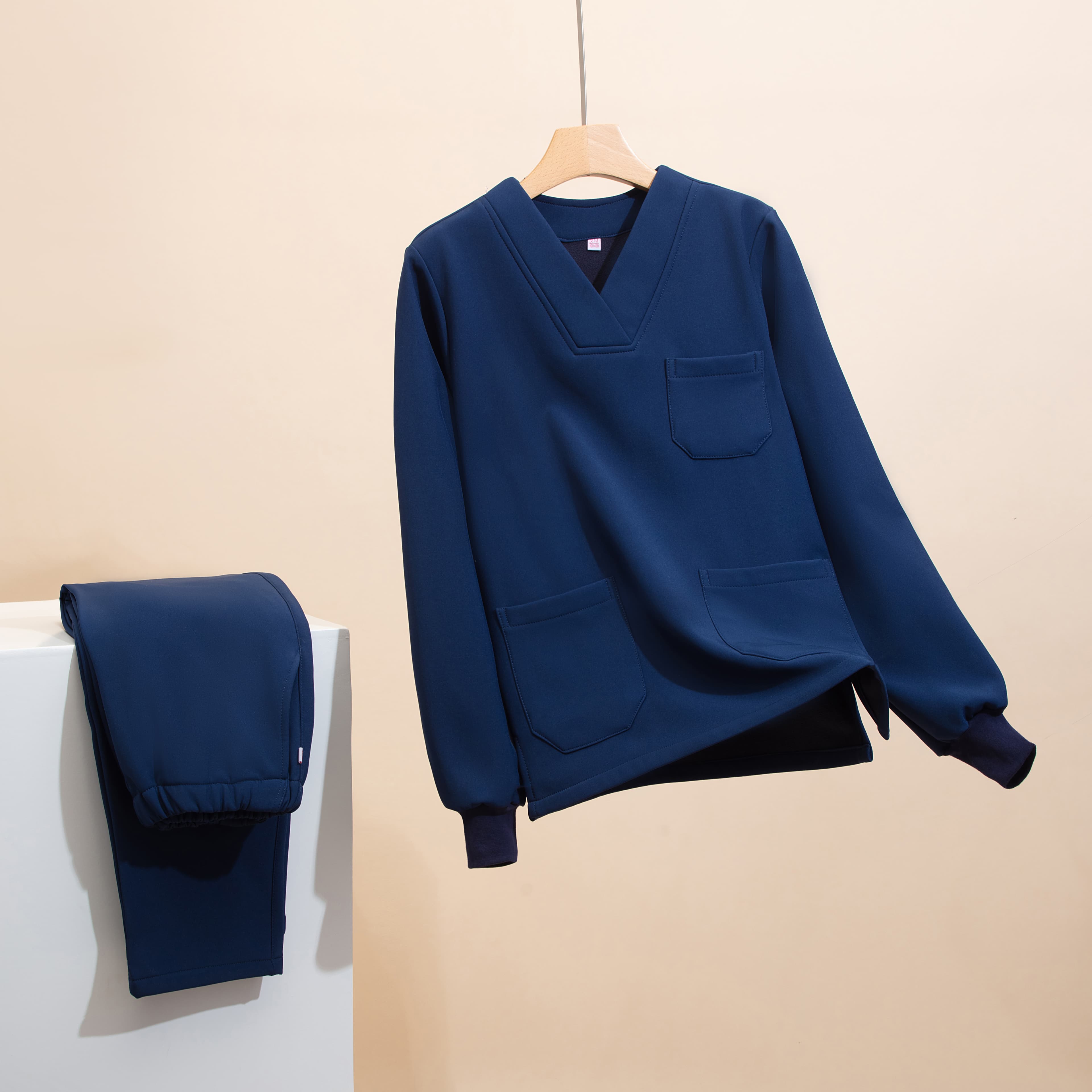 Navy long-sleeve scrub top and matching pants