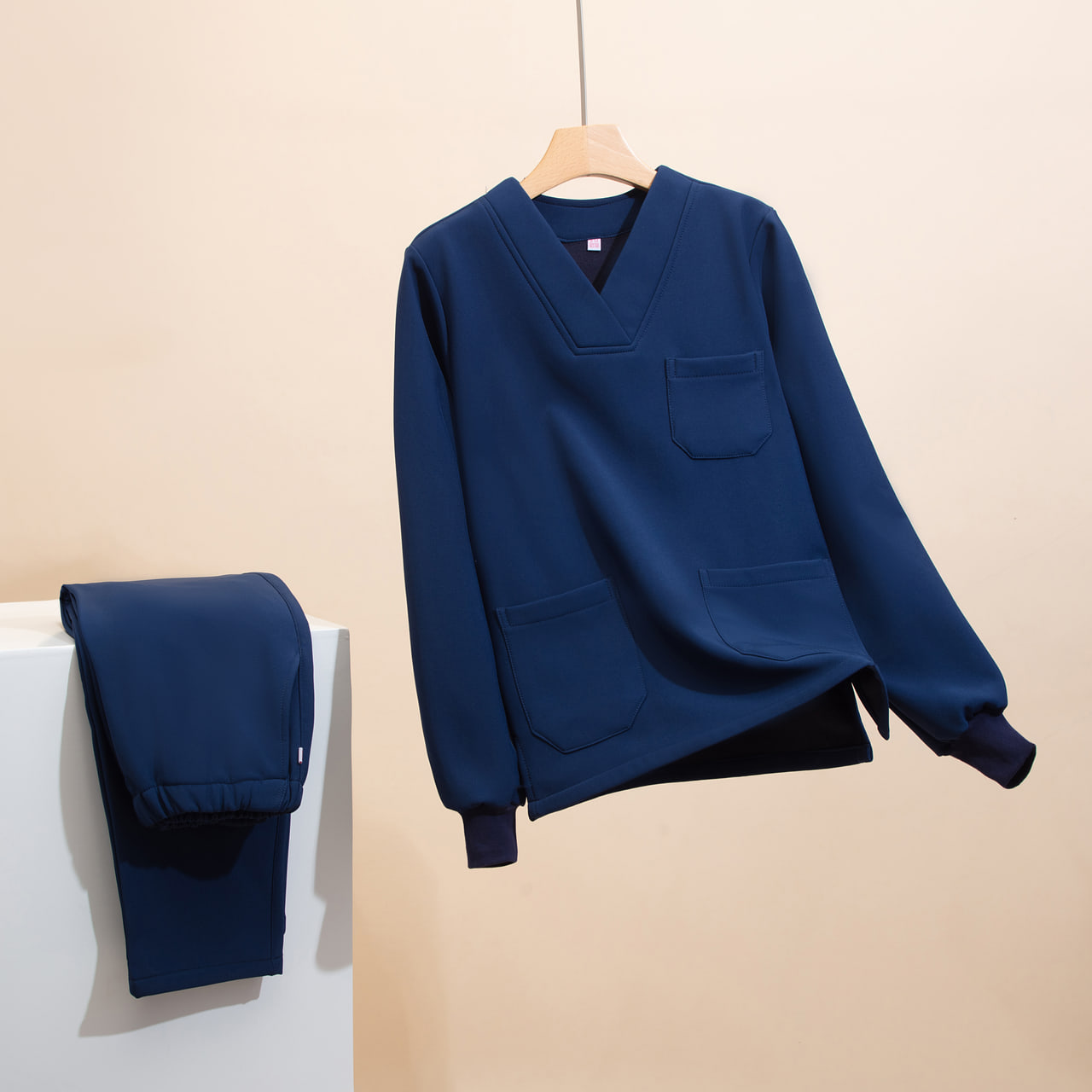 Navy long-sleeve scrub top and matching pants